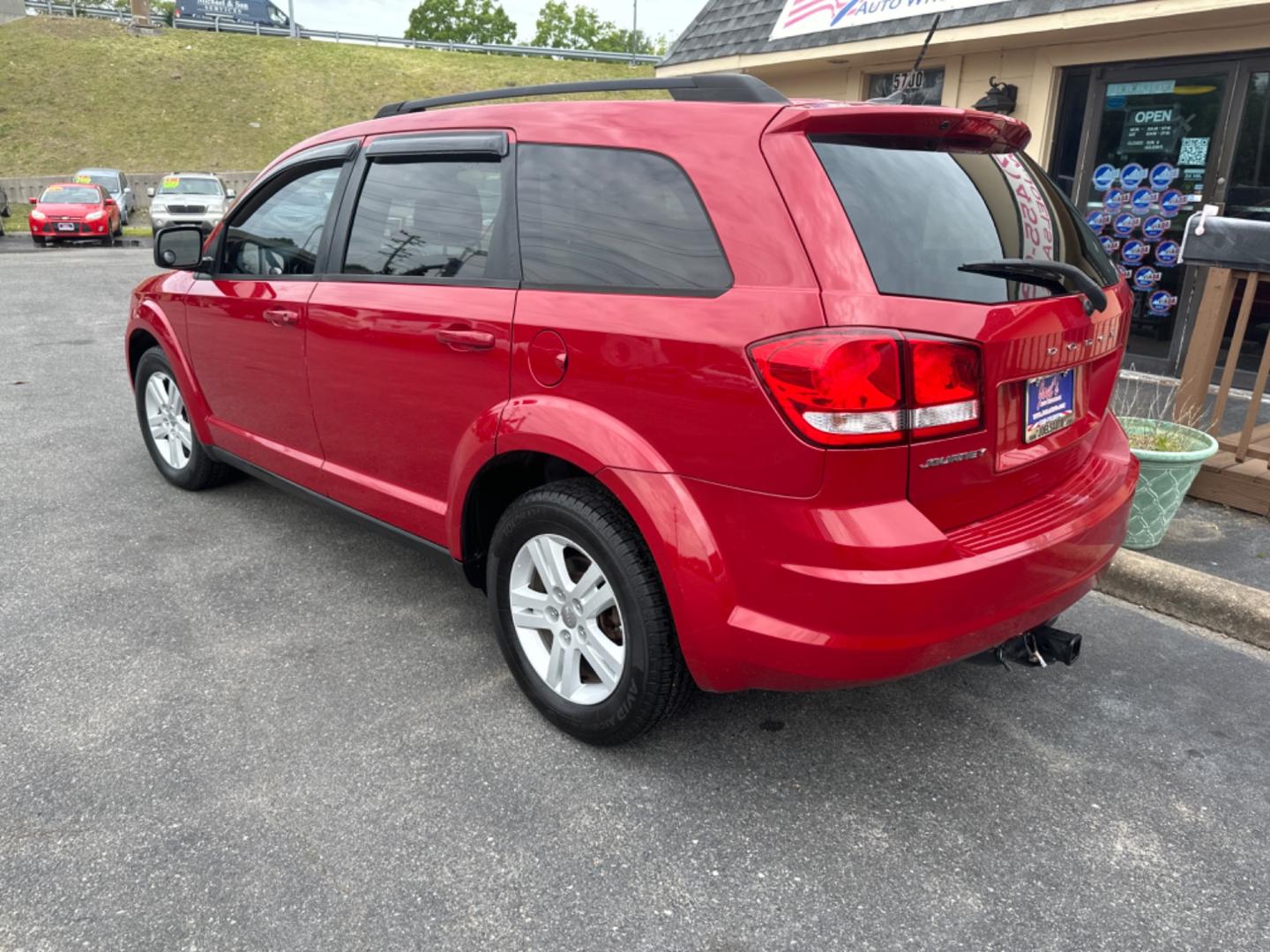 2012 Red /black Dodge Journey SE (3C4PDCAB8CT) with an 2.4L L4 DOHC 16V engine, 4-Speed Automatic transmission, located at 5700 Curlew Drive, Norfolk, VA, 23502, (757) 455-6330, 36.841885, -76.209412 - Photo#1